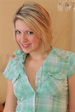  The lovely Ruby teases in her denim miniskirt and gold heels. 