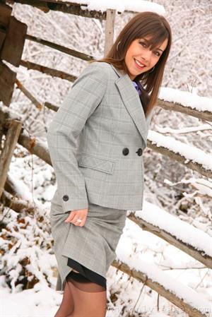  Emma H looking stunning in the snow in her sexy secretary outfit. 