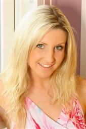  Blonde busty Alexandra in summer outfit with tan stockings 