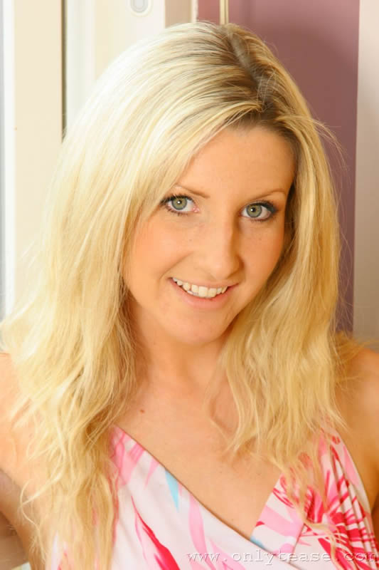  Blonde busty Alexandra in summer outfit with tan stockings 