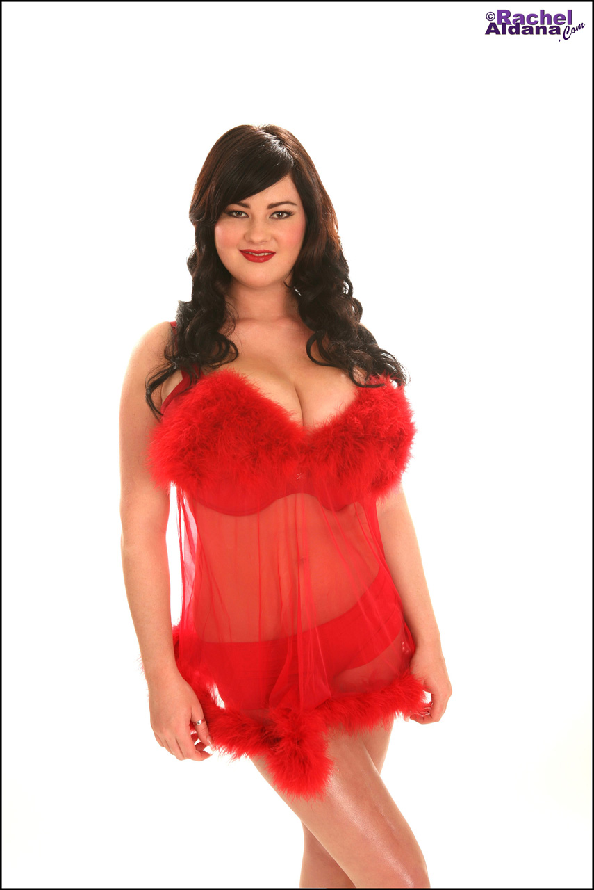 Rachel dresses up in red feathery lingerie