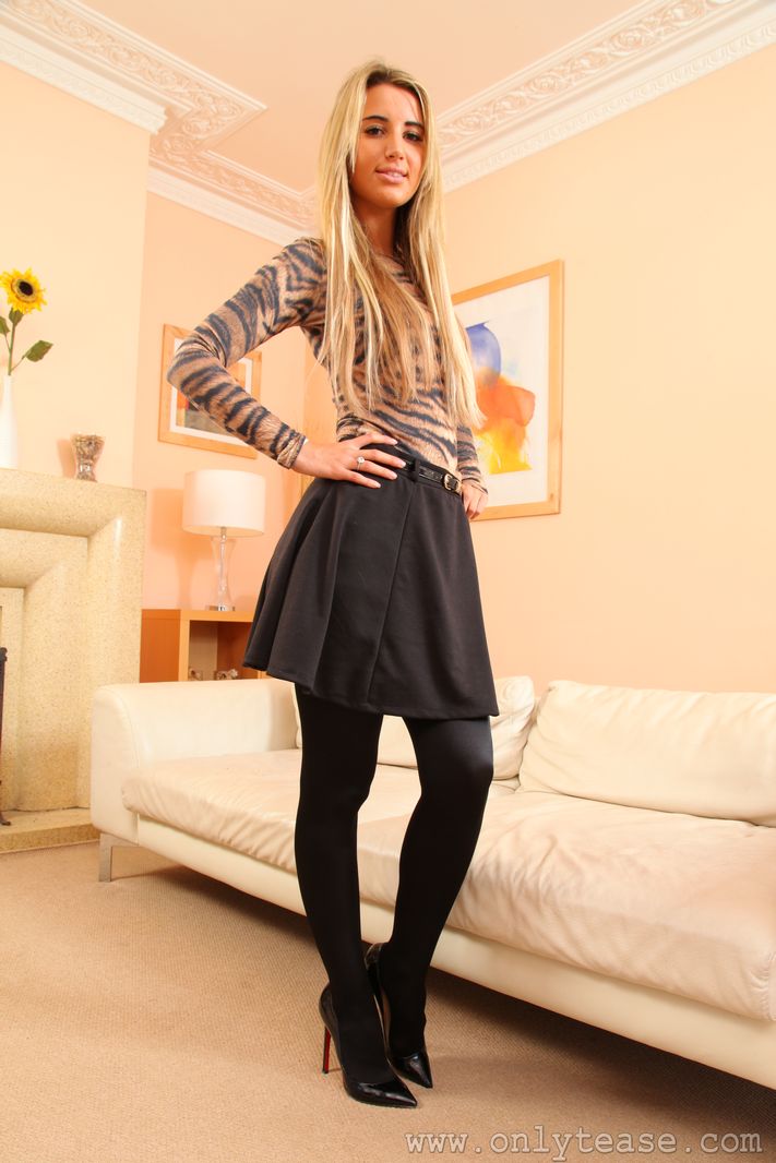  Stunning blonde in black shiny tights 