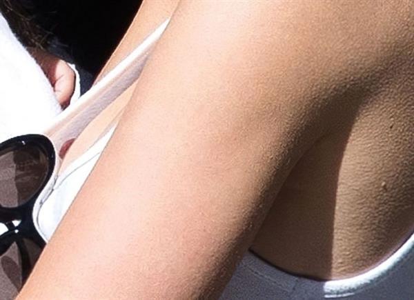 Lily-Rose Depp nip slip wardrobe malfunction accidentally flashing her tits going braless caught by paparazzi.