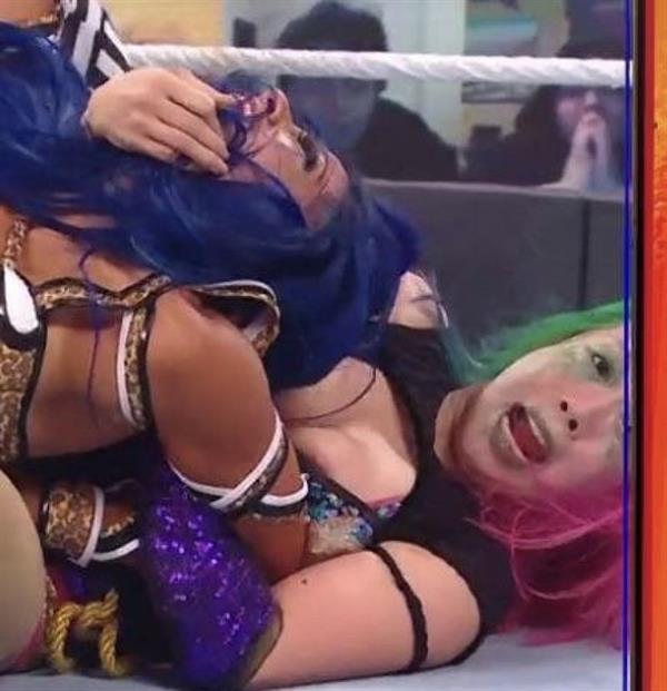 WWE Diva Asuka nip slip wardrobe malfunction accidentally flashing her big tits during summer slam.