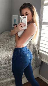 Elizabeth Zaks taking a selfie and - ass