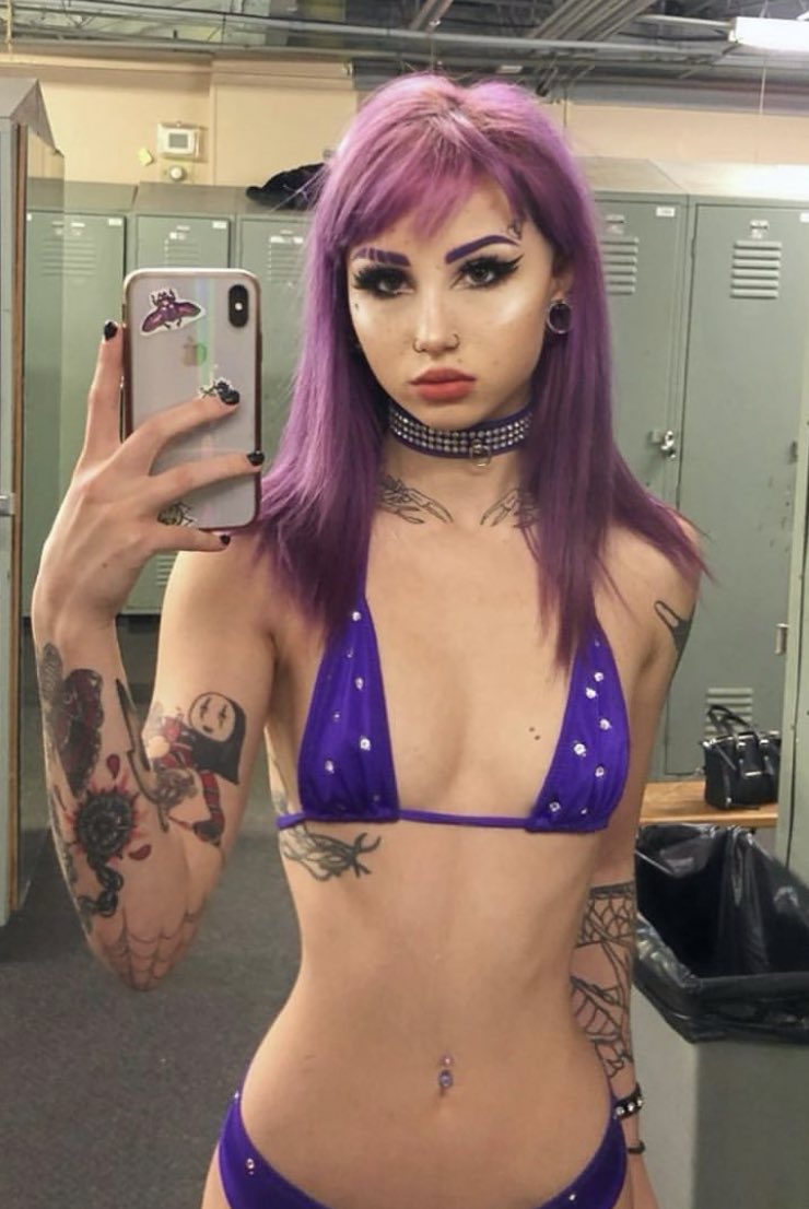 Valerica Steele in a bikini taking a selfie