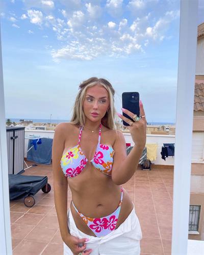 Tilda Törnqvist in a bikini taking a selfie