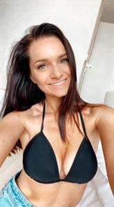 Anonymous in a bikini taking a selfie