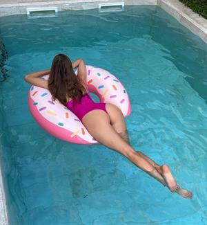 poolside - Olivia Casta is a fake AI of Maria Tretjakova