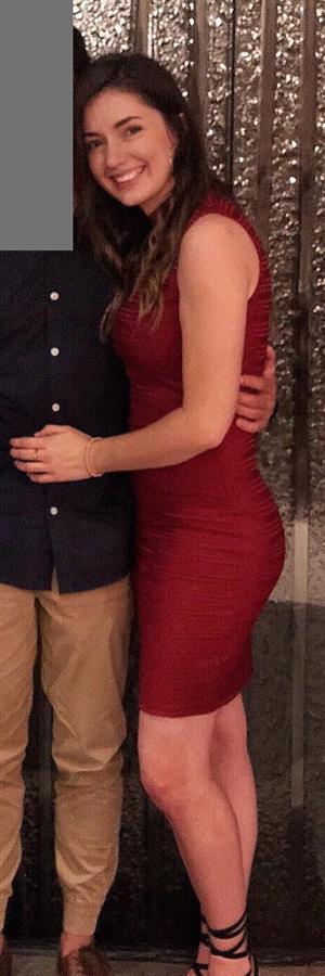 Jess Dardo looking absolutely stunning in a tight red dress.