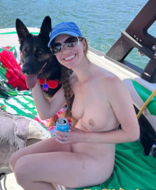 sexy babe having fun with a dog