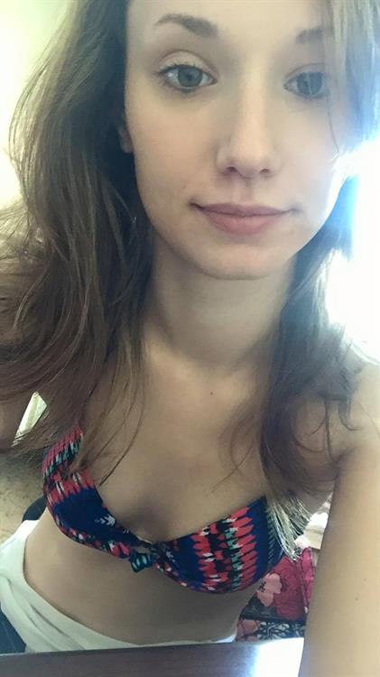 Liv in a bikini taking a selfie