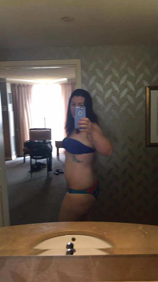 Amanda Lynn McCarthy in a bikini taking a selfie