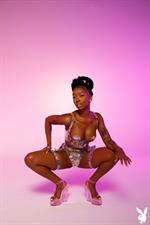 Sabrea Phenix flirty ebony in the studio for Playboy