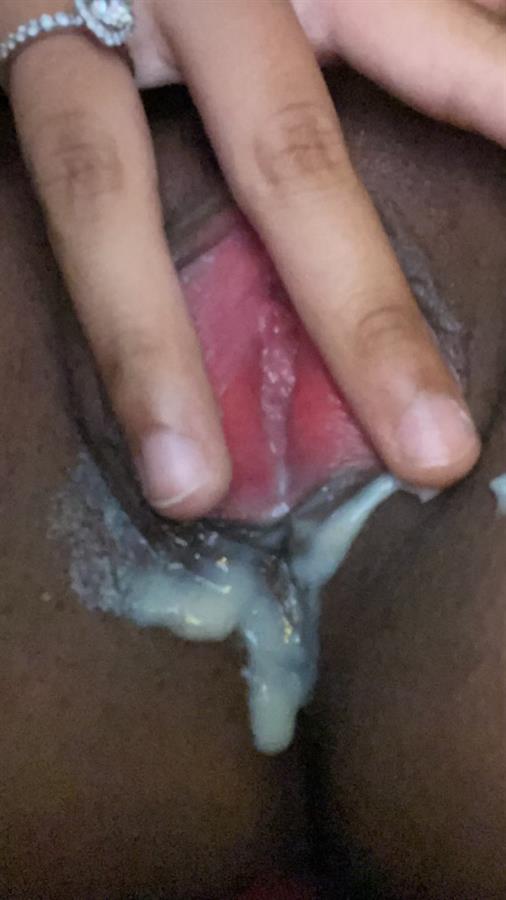 Spreading her creampied vagina