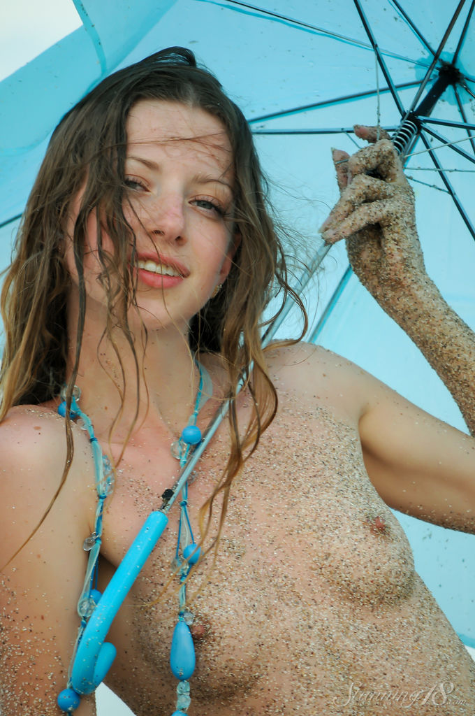 Mika - Umbrella at the Beach