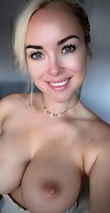 Whitney B taking a selfie and - breasts