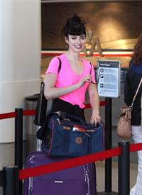 Krysten Ritter - Prepares to leave LAX in Los Angeles, California - June 8, 2012 