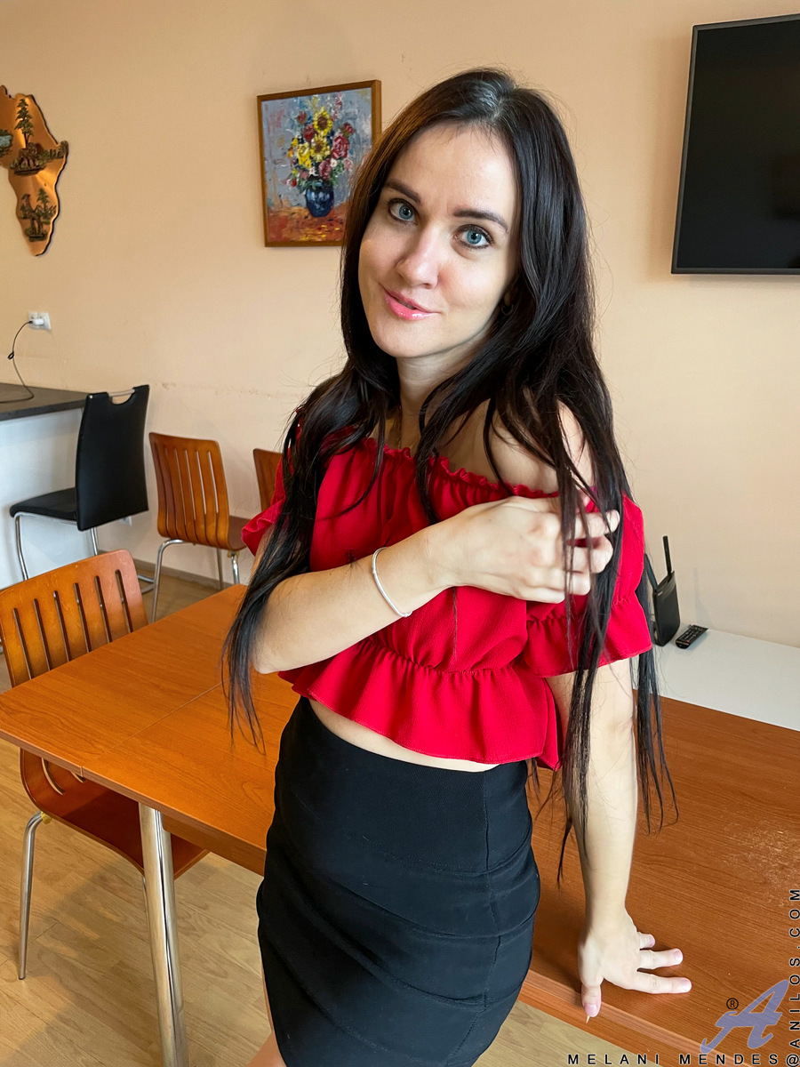 Chic and sexy when she's dressed up to run errands and attract attention Melani Mendes is even hotter when she comes home and begins taking it all off.