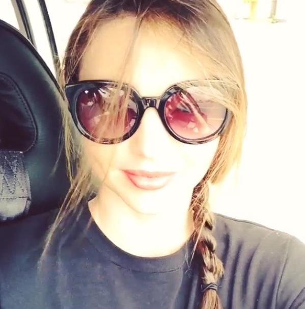 Miranda Kerr taking a selfie