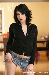 Riley Mason strips off her mini shirt