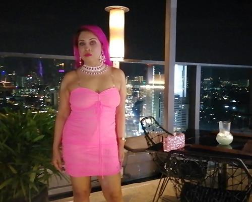 Celebrity Pink Babe on neon pink net costume in a movie  