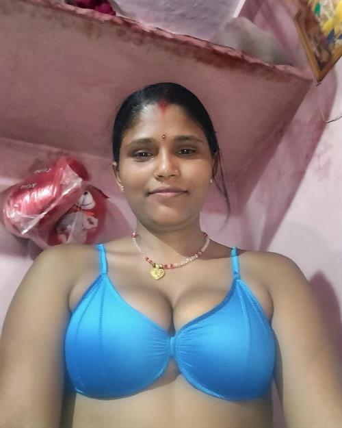 Sexy girl in a bikini taking a selfie
