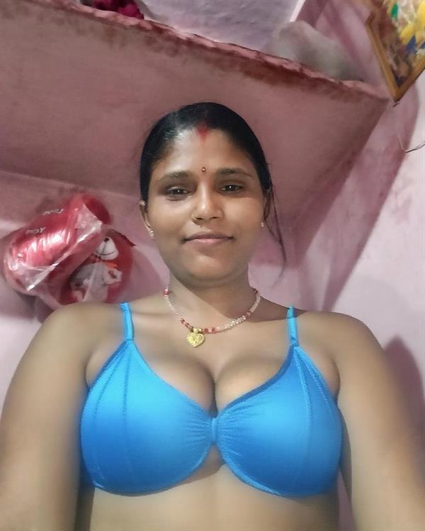 Sexy girl in a bikini taking a selfie