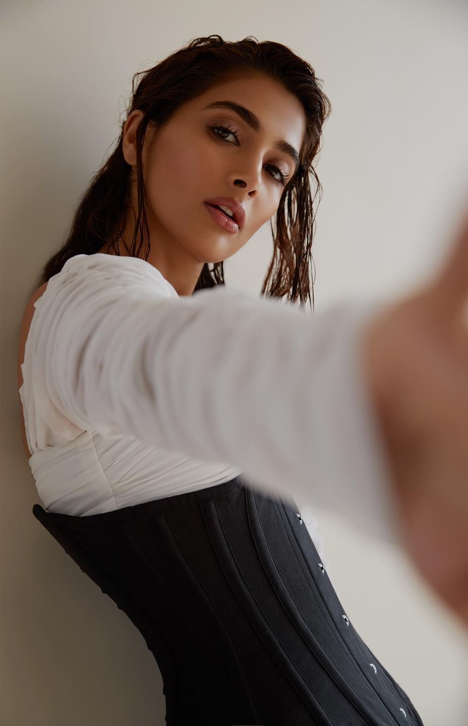 Pooja Hegde taking a selfie