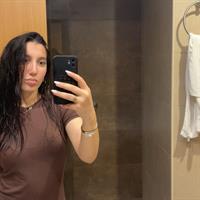 Cute girl with wet hair and Persian family background