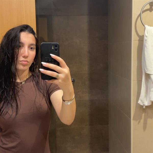 Cute girl with wet hair and Persian family background