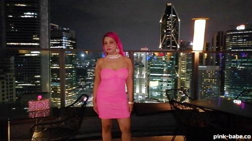 Celebrity Pink Babe on neon pink net costume in a movie 