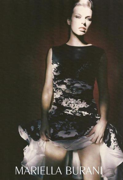 Milla Jovovich in a bikini