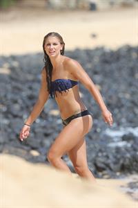 Alex Morgan and Sydney Leroux in bikinis on the beach in Hawaii