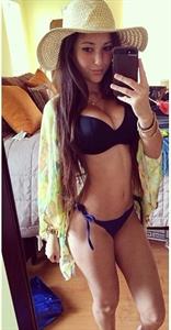 Angie Varona in a bikini taking a selfie